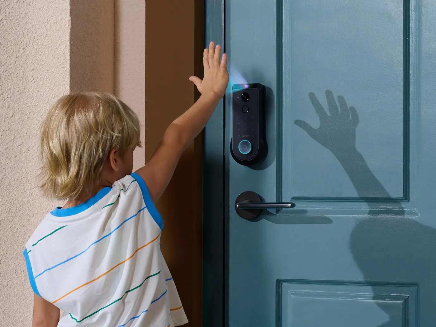 Child unlocking a Lockin deadbolt with his palm
